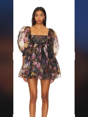 Likely Minidress black multi with accents and voluminous tiered ruffle.